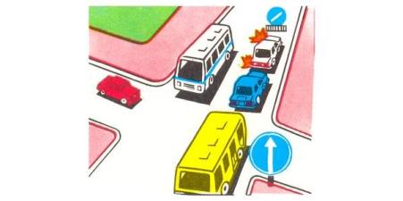 Is the driver of a yellow bus allowed to drive into an intersection?