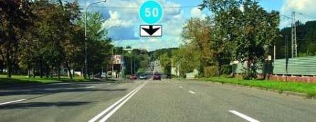 What speed mode is set by these signs on the road?