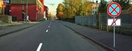 Which vehicles are not affected by the stop sign in this case?