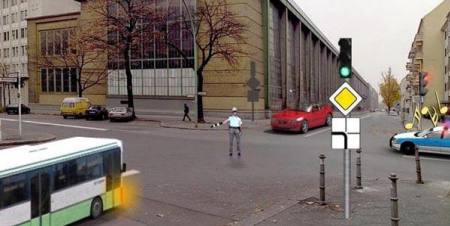 Which vehicles have the right to continue driving in this situation?