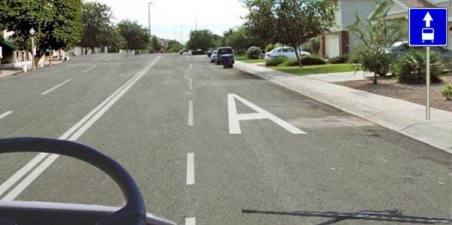 Is the tourist bus driver allowed to drive in the "A" lane?