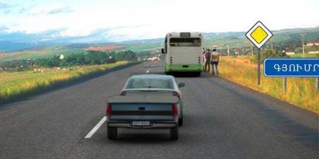The driver of the bus has made a stop to board passengers. A passenger car is moving at a speed of 70 km/h. Which vehicle driver violated the traffic rules?