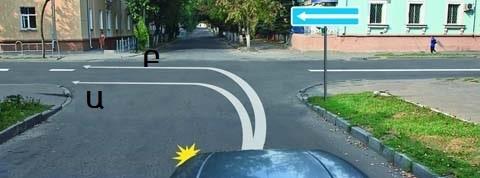 Along which trajectory does the driver have the right to make a left turn in this situation?