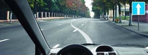 In this situation, which turn signal must the driver switch on when stopping?