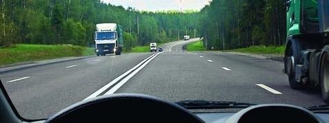 After passing the truck, in which lane may you continue driving?
