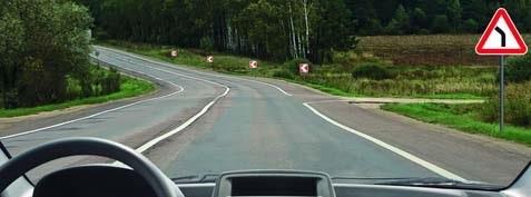 Is a right turn onto the unpaved (dirt) road allowed?