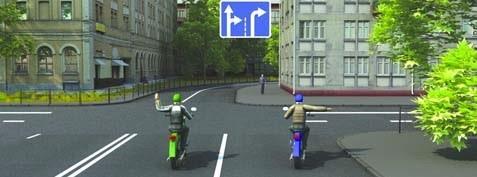 Which driver is giving a right-turn signal?